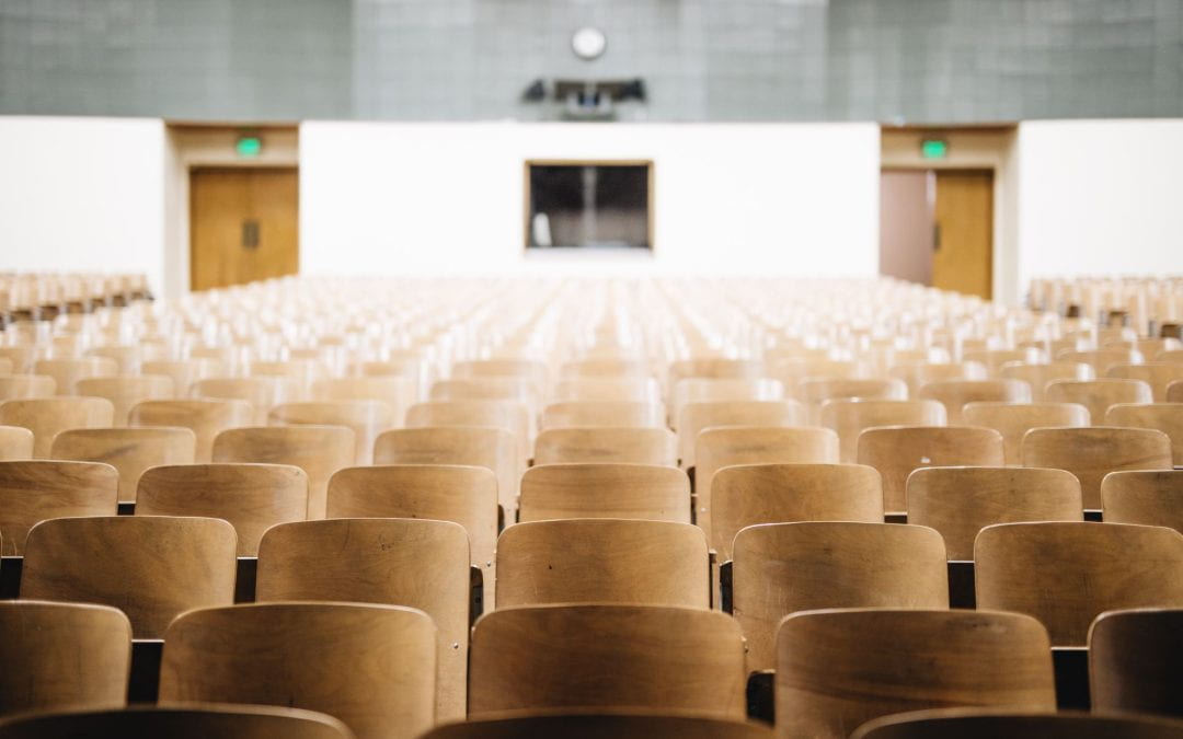 Stock photo of an empty lecture hall.